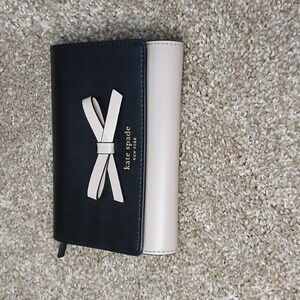 Kate Spade Sawyer Street Callie Black and Pink leather wallet clutch.